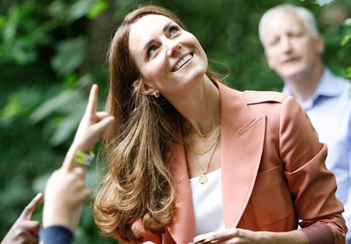 Kate Middleton Stuns in Navy Suit and Chunky Gold Necklace